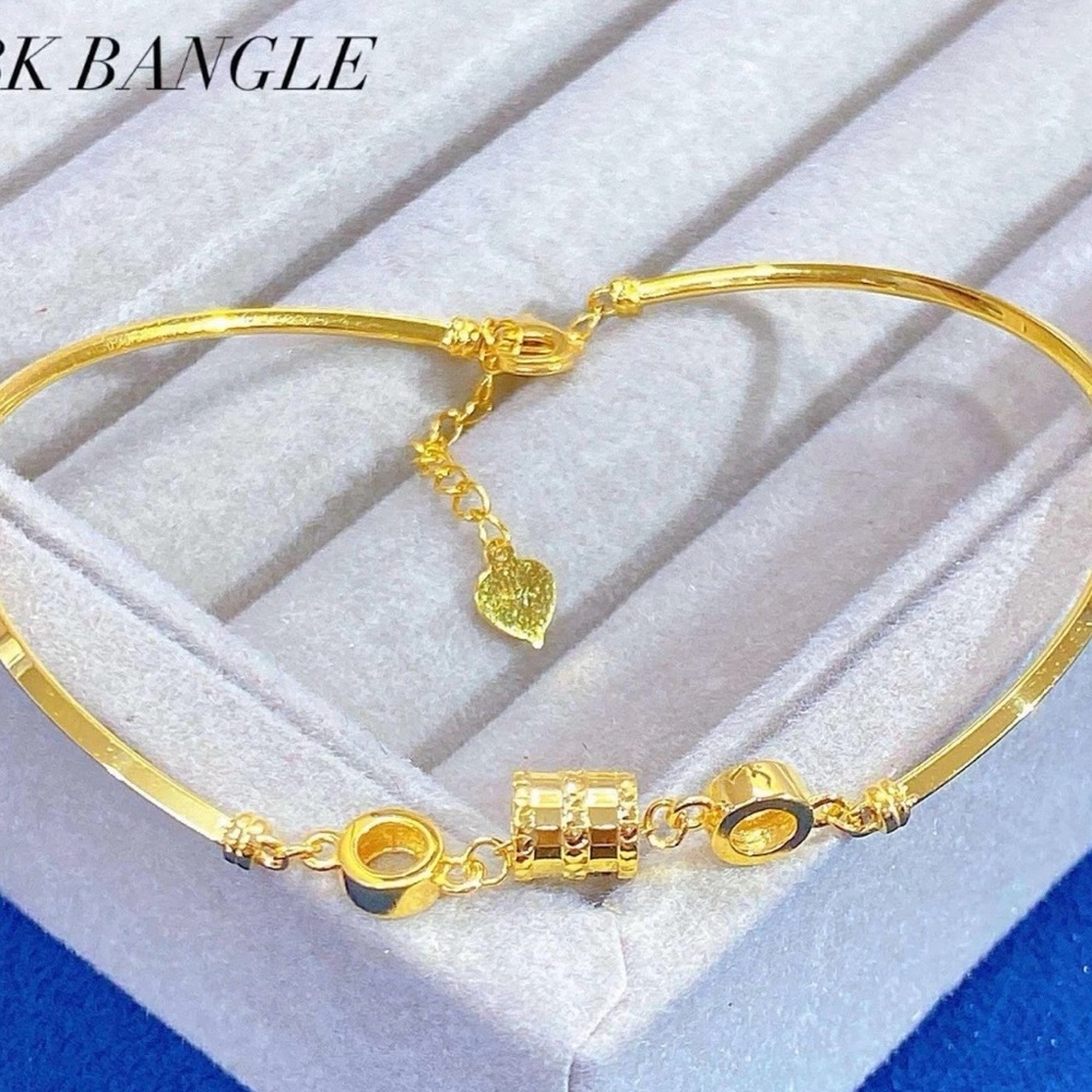 18k  Saudi gold ADJUSTABLE  BARREL  Charm  Bracelet 7”